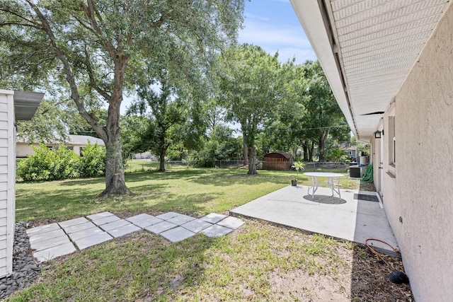 6905 Bayard Rd, Fort Pierce, FL 34951 - view of yard with a patio, central air condition unit, and an outdoor structure