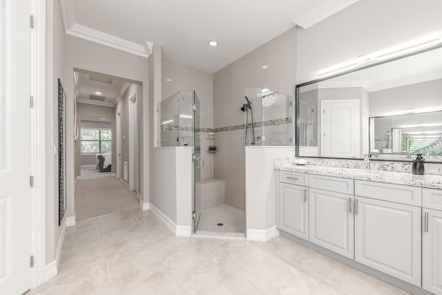 5211 SW Blue Daze Way, Palm City, FL 34990 - bathroom with crown molding, a stall shower, baseboards, vanity, and ensuite bathroom
