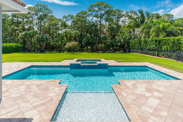 5211 SW Blue Daze Way, Palm City, FL 34990 - view of swimming pool with a patio, a pool with connected hot tub, and view of wooded area