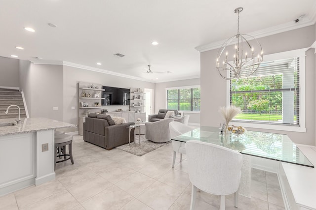 5211 SW Blue Daze Way, Palm City, FL 34990 - dining area featuring crown molding, a chandelier, recessed lighting, a ceiling fan, and stairway