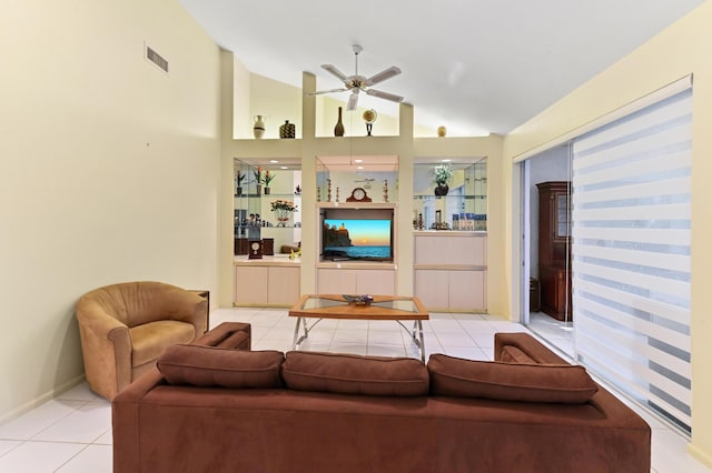 11683 Briarwood Cir Unit 4, Boynton Beach, FL 33437 - living room with vaulted ceiling, light tile patterned floors, ceiling fan, and baseboards