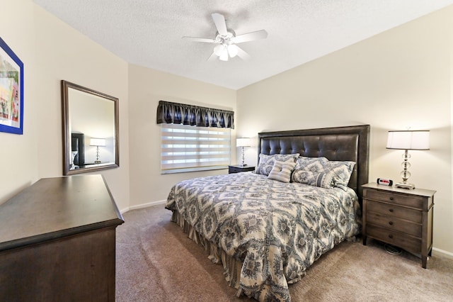 11683 Briarwood Cir Unit 4, Boynton Beach, FL 33437 - carpeted bedroom with a textured ceiling, baseboards, and a ceiling fan