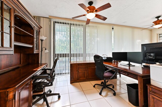 11683 Briarwood Cir Unit 4, Boynton Beach, FL 33437 - home office featuring a ceiling fan, light tile patterned floors, and a textured ceiling
