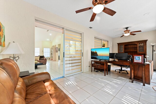 11683 Briarwood Cir Unit 4, Boynton Beach, FL 33437 - home office featuring ceiling fan, tile patterned flooring, and arched walkways