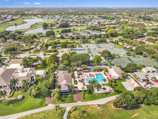 11683 Briarwood Cir Unit 4, Boynton Beach, FL 33437 - aerial view of property and surrounding area featuring a nearby body of water, nearby suburban area, and a pool area