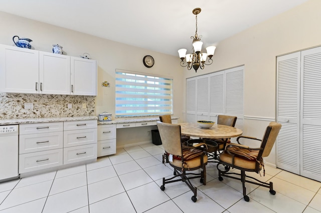 11683 Briarwood Cir Unit 4, Boynton Beach, FL 33437 - dining space with a chandelier, light tile patterned floors, and a desk