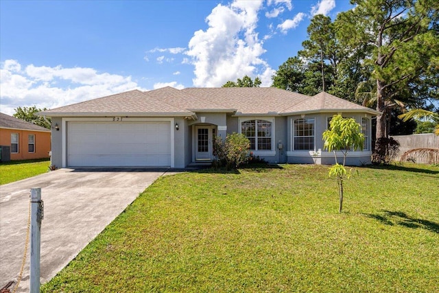 531 SE Evergreen Ter, Port Saint Lucie, FL 34983 - single story home with a garage, stucco siding, concrete driveway, and central AC