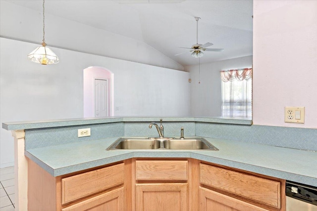 531 SE Evergreen Ter, Port Saint Lucie, FL 34983 - kitchen with a sink, ceiling fan, arched walkways, light countertops, and lofted ceiling
