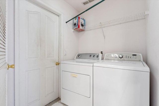 531 SE Evergreen Ter, Port Saint Lucie, FL 34983 - clothes washing area featuring washer and clothes dryer