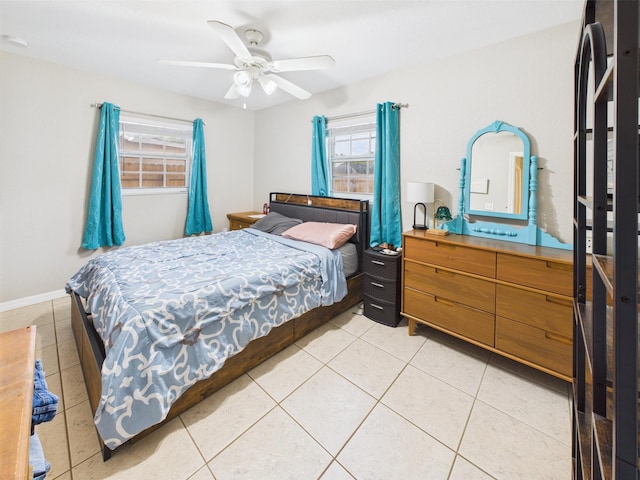 3307 SW 22nd St, Okeechobee, FL 34974 - bedroom with multiple windows, light tile patterned flooring, and ceiling fan