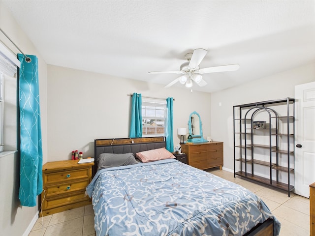 3307 SW 22nd St, Okeechobee, FL 34974 - bedroom featuring tile patterned floors, baseboards, and a ceiling fan