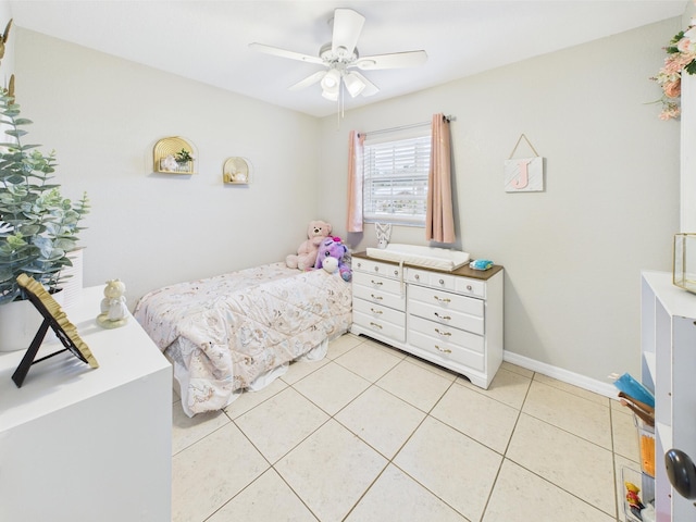 3307 SW 22nd St, Okeechobee, FL 34974 - bedroom featuring light tile patterned flooring, baseboards, and a ceiling fan