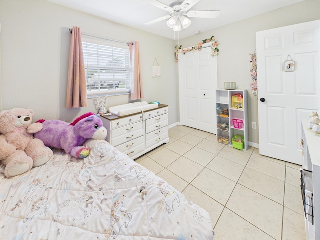 3307 SW 22nd St, Okeechobee, FL 34974 - bedroom featuring light tile patterned flooring, ceiling fan, and baseboards