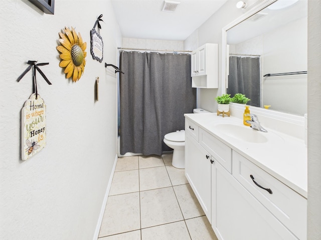 3307 SW 22nd St, Okeechobee, FL 34974 - full bathroom with tile patterned flooring, baseboards, toilet, vanity, and a shower with shower curtain