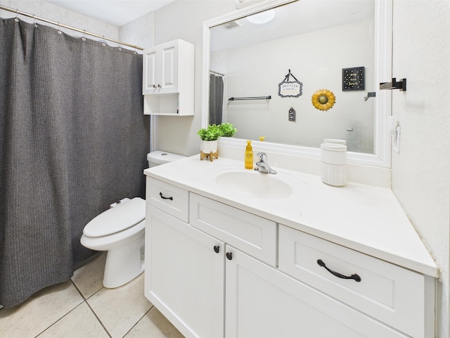 3307 SW 22nd St, Okeechobee, FL 34974 - full bathroom with toilet, tile patterned flooring, and vanity