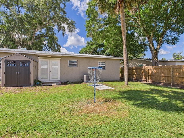 3307 SW 22nd St, Okeechobee, FL 34974 - back of house featuring stucco siding, metal roof, and central AC unit