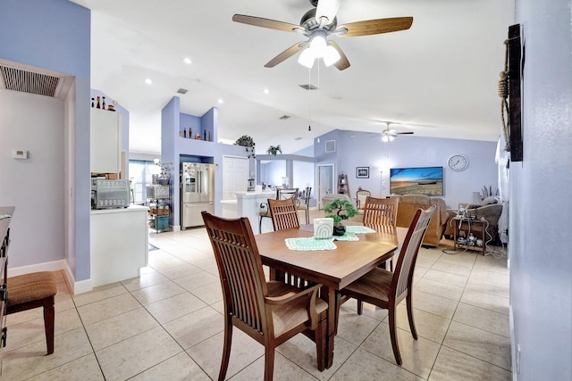 1226 SW San Antonio Ave, Port Saint Lucie, FL 34953 - dining area featuring ceiling fan, vaulted ceiling, light tile patterned flooring, and baseboards