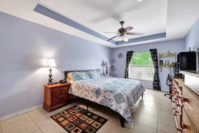 1226 SW San Antonio Ave, Port Saint Lucie, FL 34953 - bedroom featuring a raised ceiling, baseboards, and light tile patterned floors