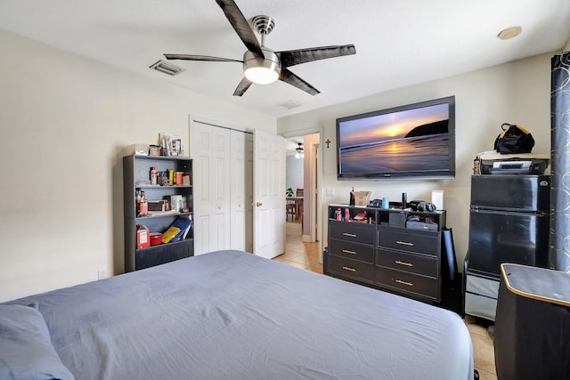 1226 SW San Antonio Ave, Port Saint Lucie, FL 34953 - bedroom featuring light tile patterned flooring, ceiling fan, and a closet