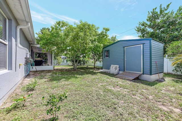 1226 SW San Antonio Ave, Port Saint Lucie, FL 34953 - view of yard featuring a shed and an outbuilding
