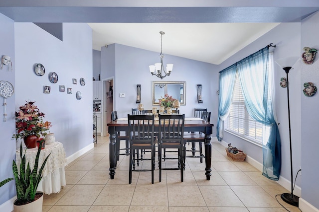 1226 SW San Antonio Ave, Port Saint Lucie, FL 34953 - dining space with lofted ceiling, a chandelier, baseboards, and light tile patterned flooring