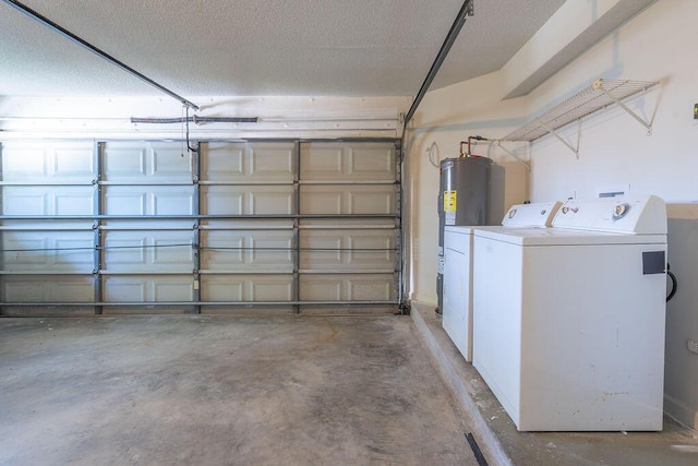garage featuring washing machine and dryer