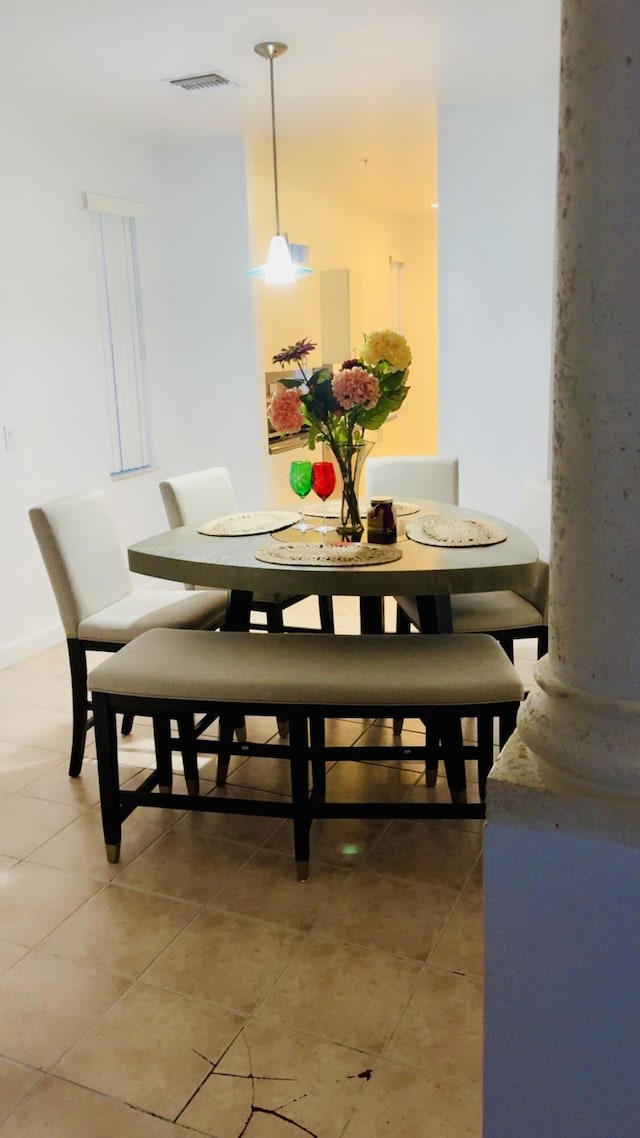 3608 Shoma Dr, Royal Palm Beach, FL 33414 - dining area with light tile patterned flooring and baseboards