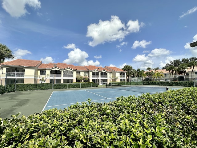 815 W Boynton Beach Blvd Unit 8-204, Boynton Beach, FL 33426 - view of tennis court with fence