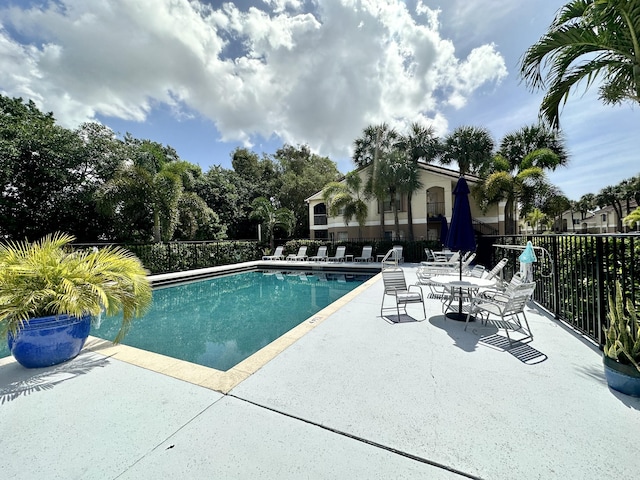 815 W Boynton Beach Blvd Unit 8-204, Boynton Beach, FL 33426 - community pool with fence and a patio area