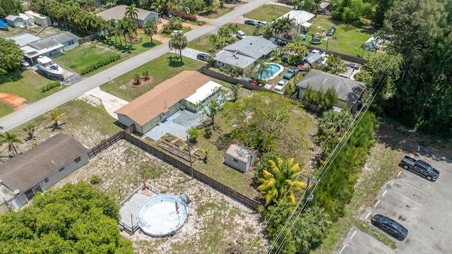 aerial view of residential area featuring a pool