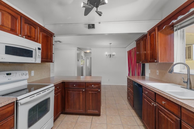 kitchen with white appliances, a sink, tasteful backsplash, light tile patterned flooring, and ceiling fan