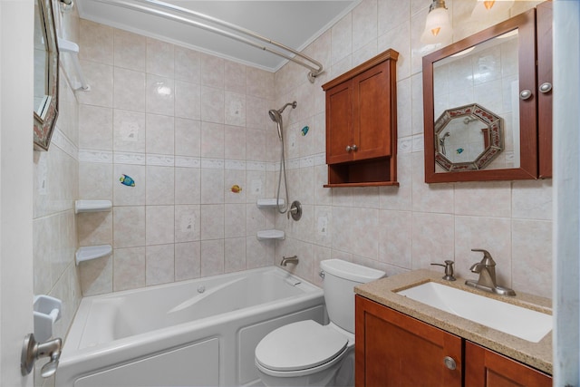 bathroom featuring tile walls, crown molding, toilet, shower / bath combination, and vanity