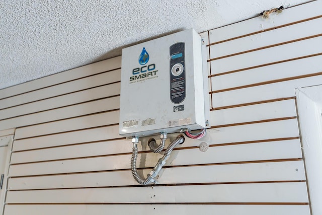 detailed view of a textured ceiling and tankless water heater