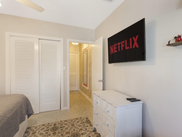 1001 N Lakeside Dr, Lake Worth Beach, FL 33460 - bedroom with speckle patterned floor, baseboards, and a closet