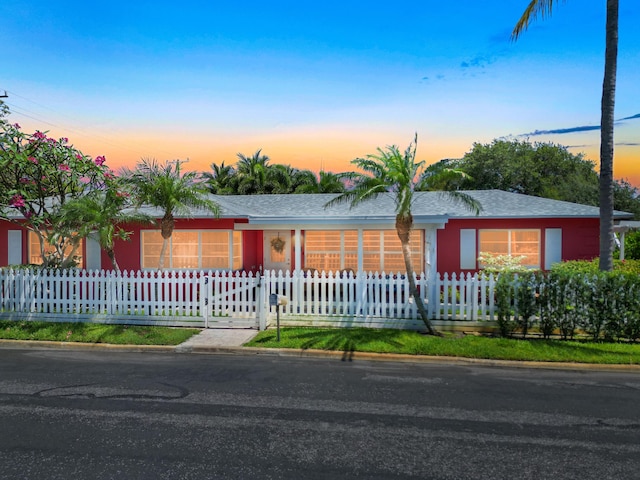 1001 N Lakeside Dr, Lake Worth Beach, FL 33460 - ranch-style home featuring a fenced front yard