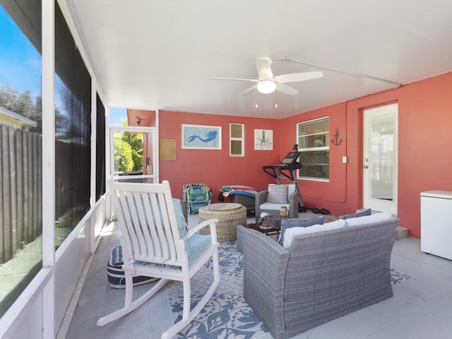 1001 N Lakeside Dr, Lake Worth Beach, FL 33460 - sunroom featuring ceiling fan and an outdoor living space