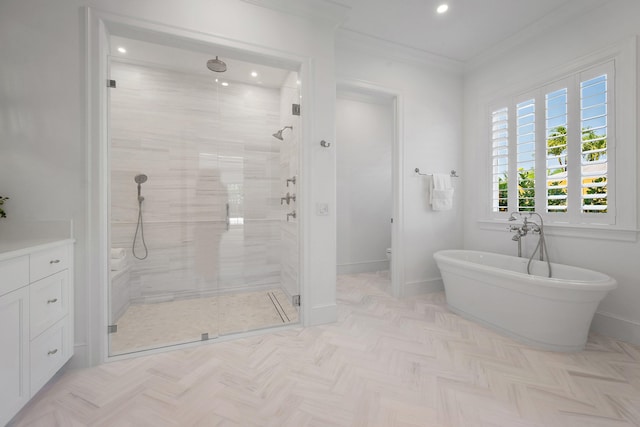 full bathroom with a stall shower, a soaking tub, recessed lighting, baseboards, and ornamental molding