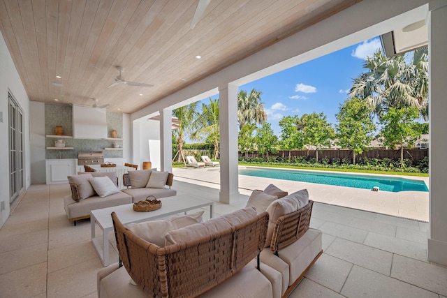 fenced backyard featuring an outdoor living space, a patio, and ceiling fan