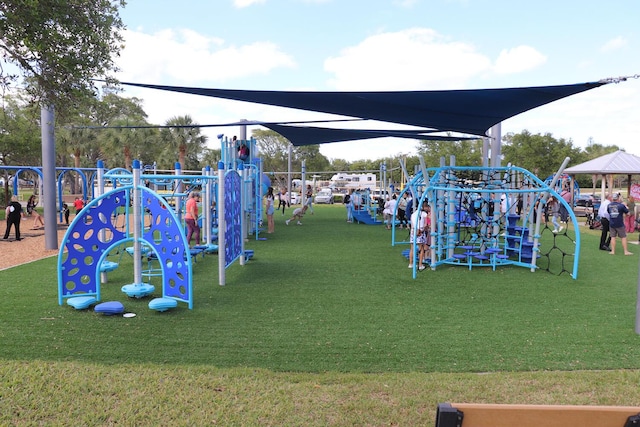 community play area with a yard