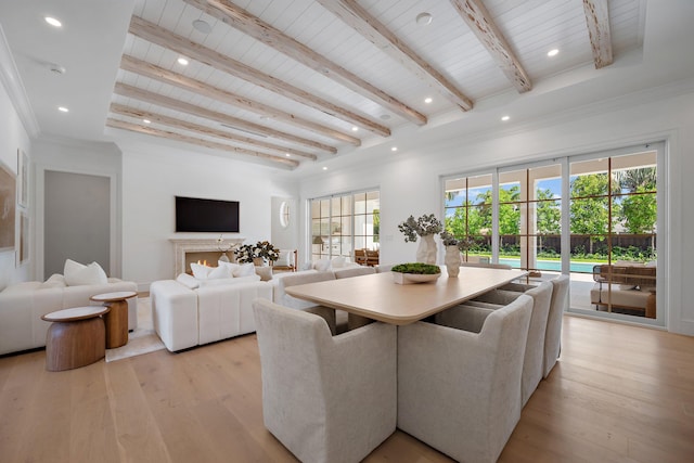 dining space featuring wooden ceiling with exposed beams, light wood-type flooring, and recessed lighting