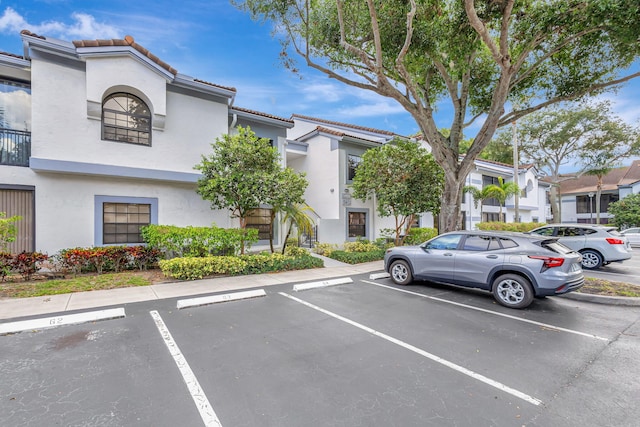 5450 Verona Dr Unit L, Boynton Beach, FL 33437 - view of uncovered parking lot