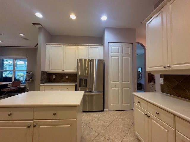 473 Cottagewood Ln, West Palm Beach, FL 33411 - kitchen with stainless steel fridge with ice dispenser, backsplash, light countertops, recessed lighting, and light tile patterned floors