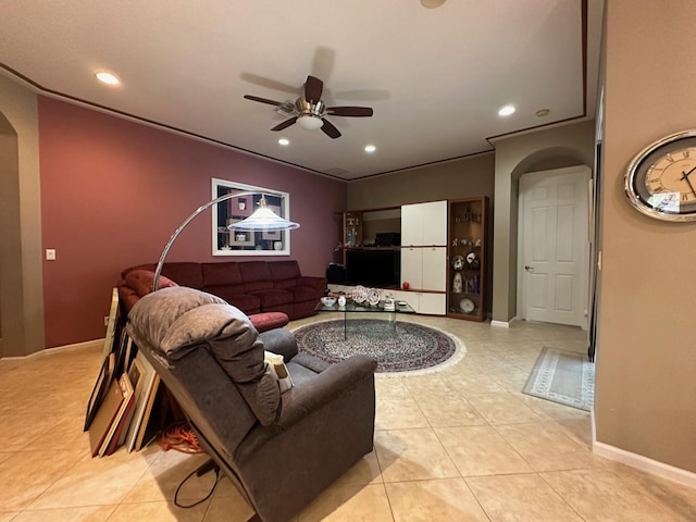 473 Cottagewood Ln, West Palm Beach, FL 33411 - living room with arched walkways, ceiling fan, recessed lighting, light tile patterned floors, and baseboards