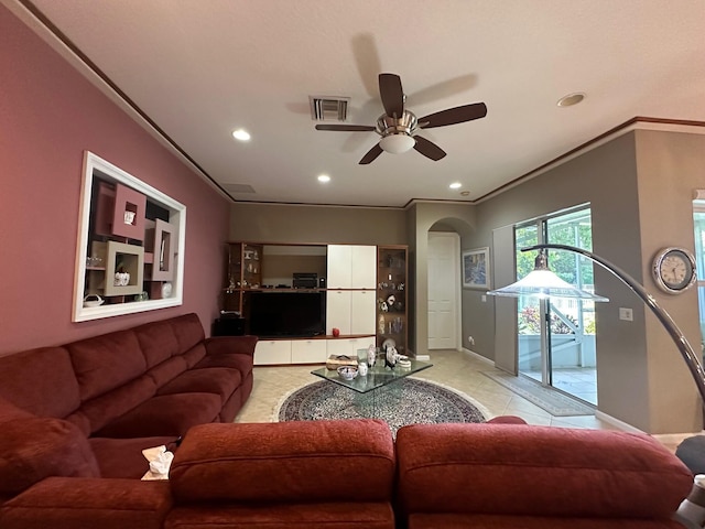 473 Cottagewood Ln, West Palm Beach, FL 33411 - living room with arched walkways, recessed lighting, ceiling fan, light tile patterned floors, and baseboards