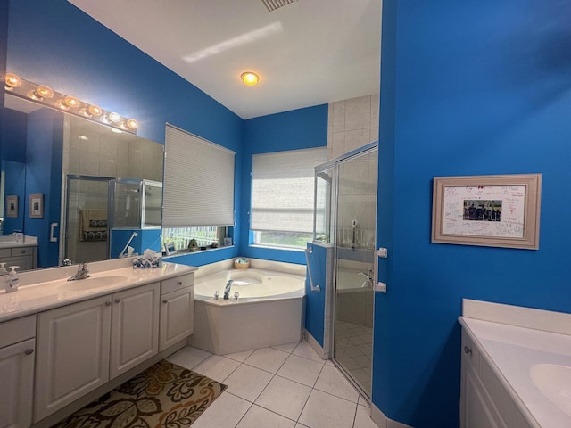 473 Cottagewood Ln, West Palm Beach, FL 33411 - full bath with a stall shower, a bath, two vanities, and tile patterned floors