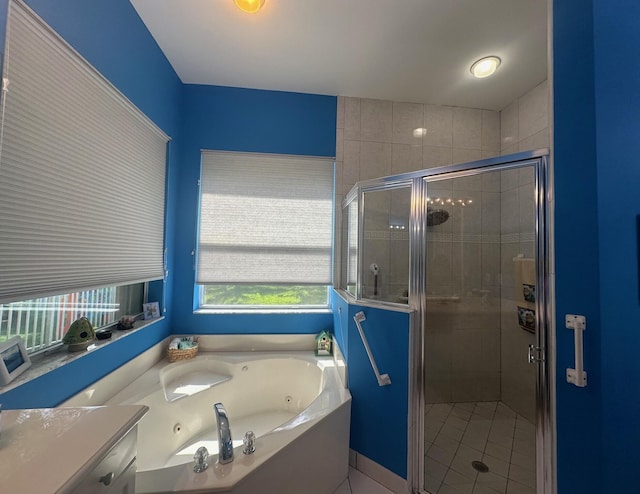 473 Cottagewood Ln, West Palm Beach, FL 33411 - bathroom with a tub with jets, a shower stall, tile patterned floors, and vanity