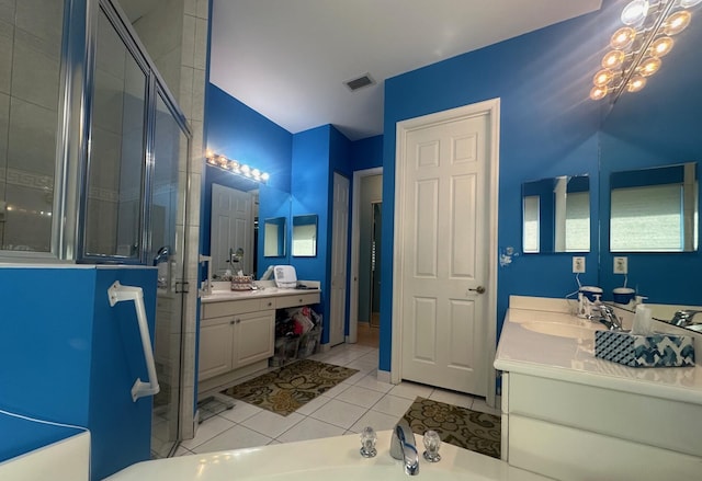 473 Cottagewood Ln, West Palm Beach, FL 33411 - full bath featuring a shower stall, two vanities, tile patterned floors, a chandelier, and a bathtub