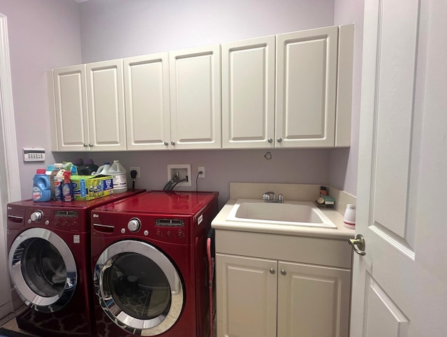 473 Cottagewood Ln, West Palm Beach, FL 33411 - laundry room featuring washing machine and dryer and cabinet space