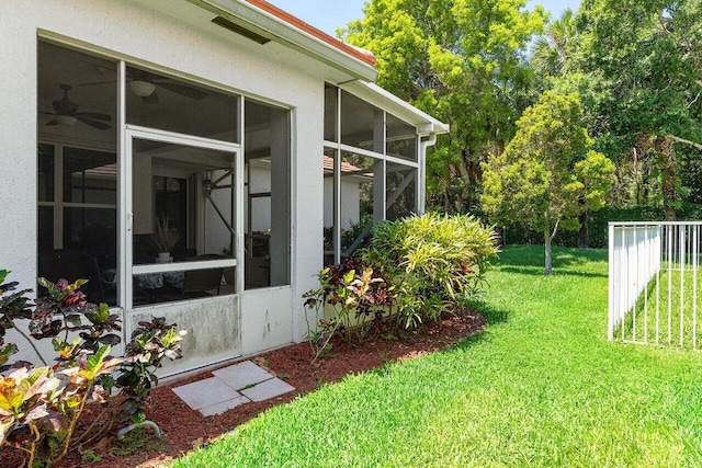 473 Cottagewood Ln, West Palm Beach, FL 33411 - view of grassy yard with a sunroom