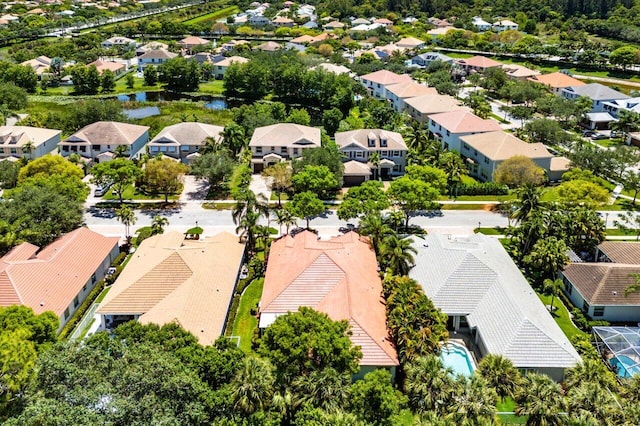 473 Cottagewood Ln, West Palm Beach, FL 33411 - aerial perspective of suburban area with a pool